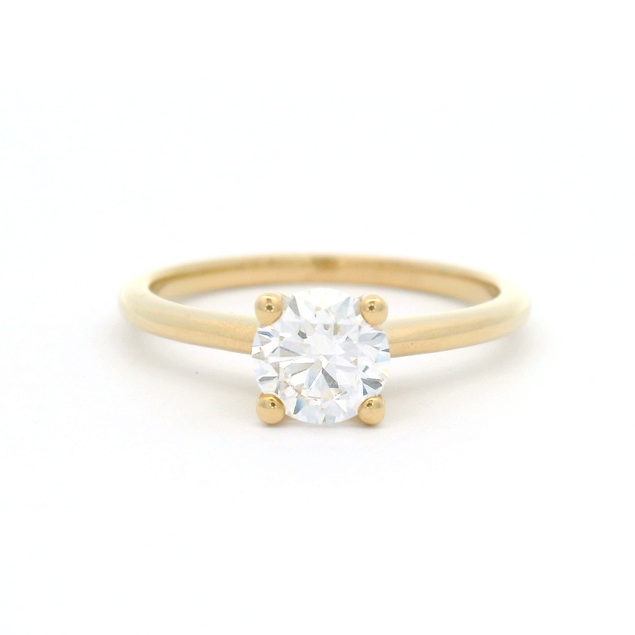 10k yellow solitaire set with 0.70ct lab-grown round brilliant cut diamond.