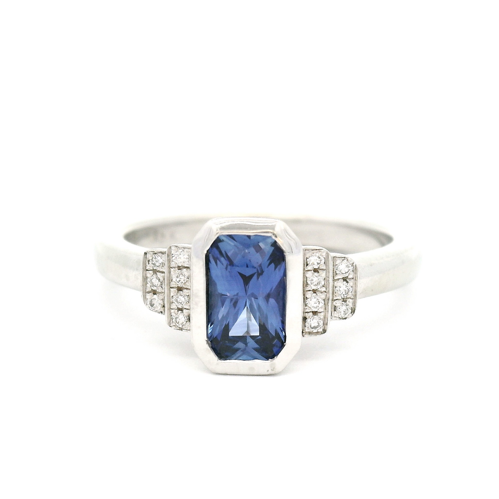 18k White Engagement Ring with 0.77ct Vibrant Blue Emerald Cut Sapphire and Accent Diamonds