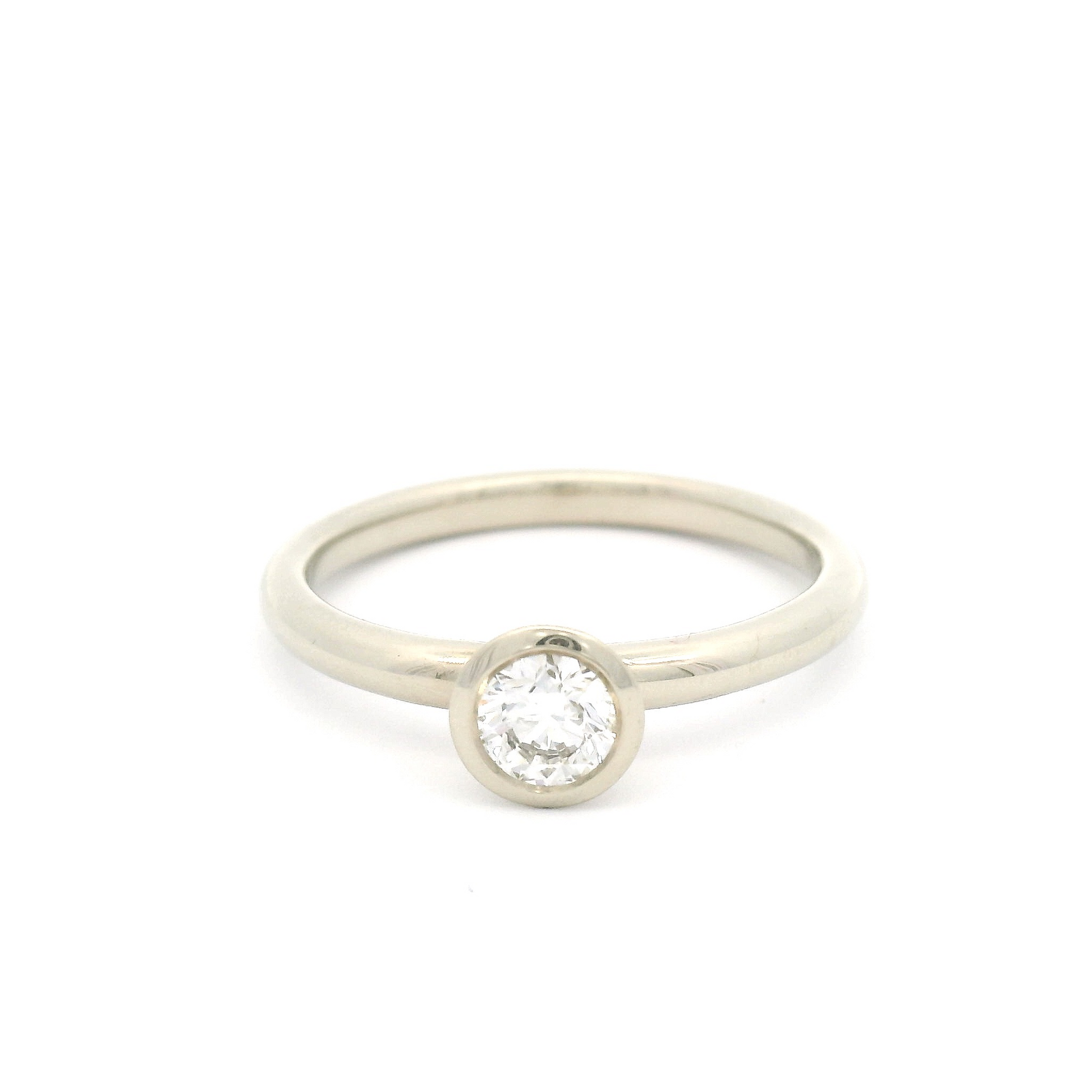 14k White Bezel Set Solitaire with 0.31ct Diamond